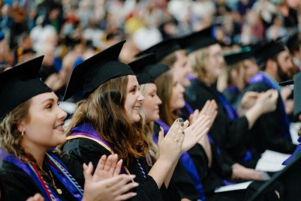 a group of people in graduation gowns